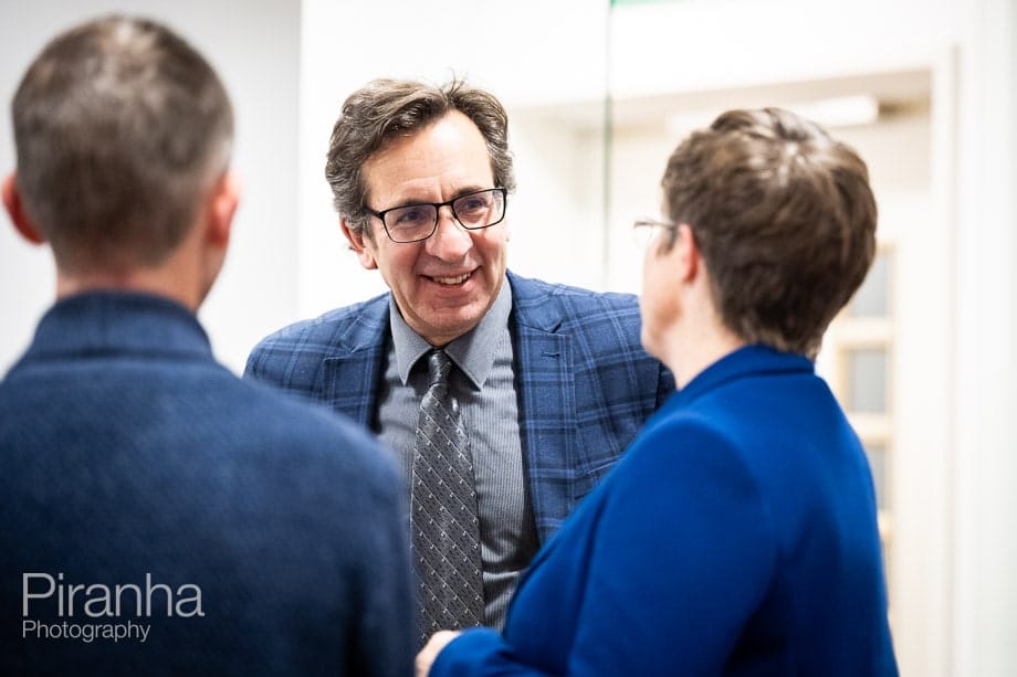 Company conference photographed in London offices.