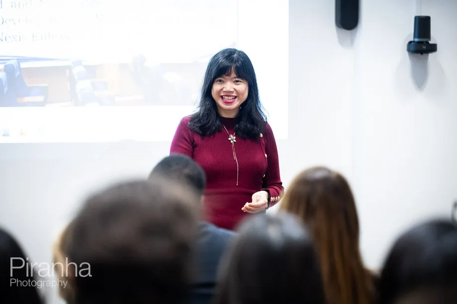Company conference photographed in London offices.