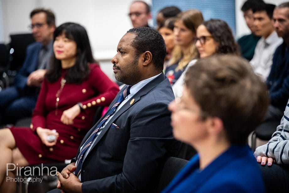 Company conference photographed in London offices.