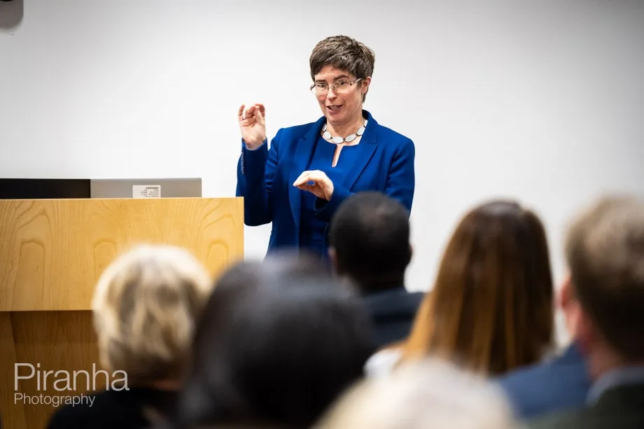 Company conference photographed in London offices.