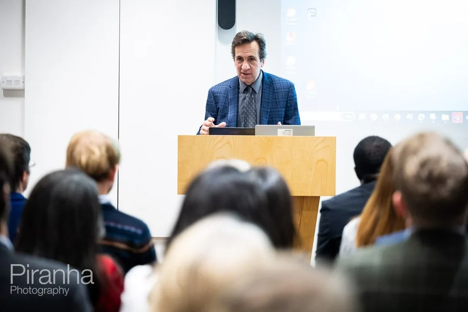 Company conference photographed in London offices.