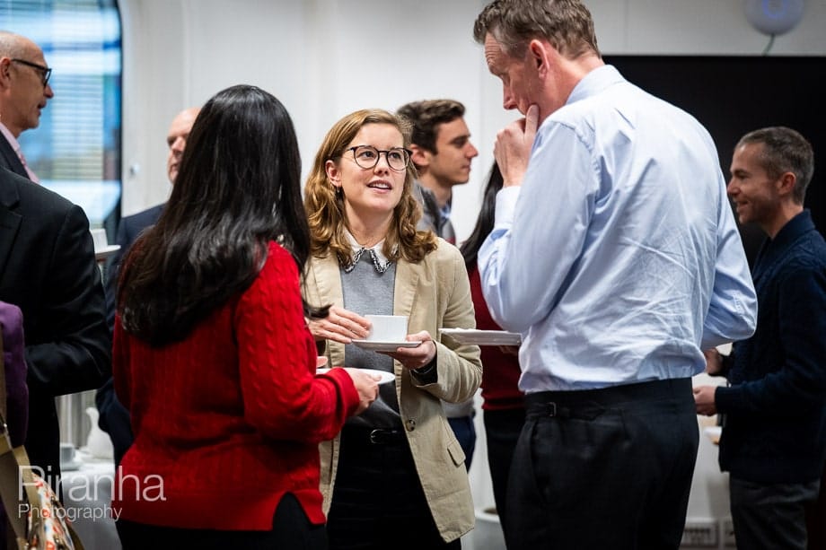Company conference photographed in London offices.
