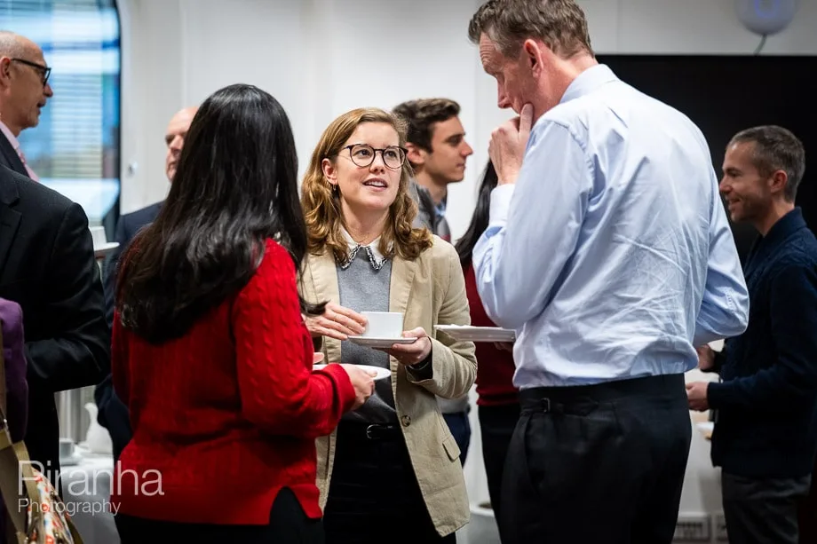 Company conference photographed in London offices.