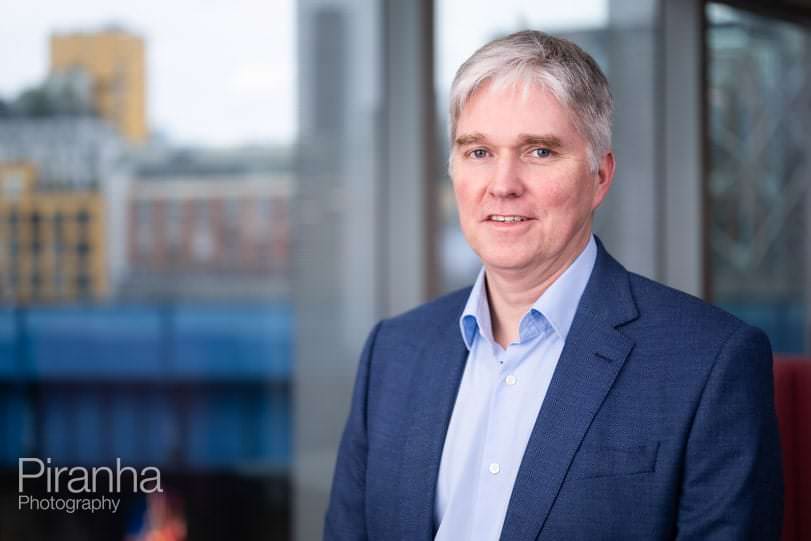 Portrait photograph of staff member for corporate company in London