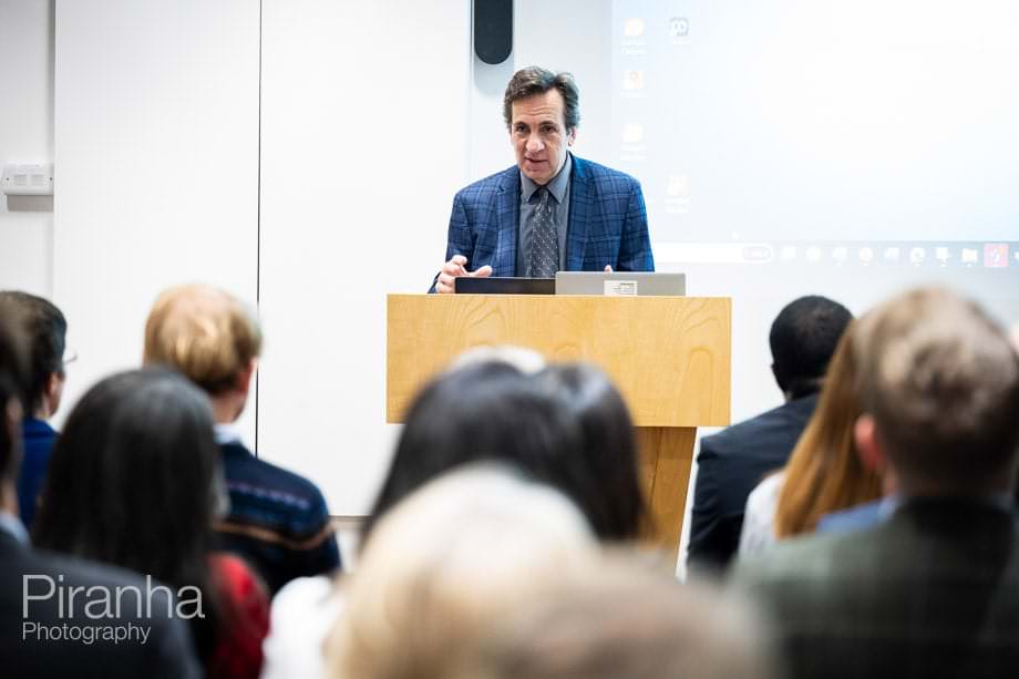 Company conference photographed in London offices.