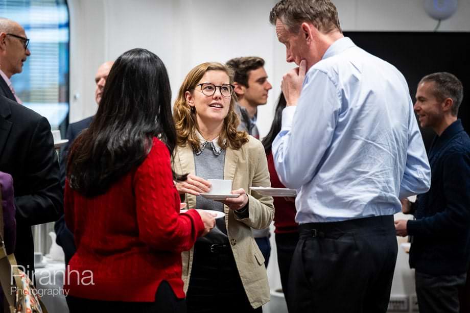 Company conference photographed in London offices.