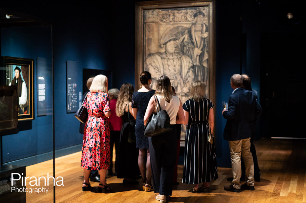 Corporate Event Photographer - Photographing Summer Parties - Tricks of the Trade 8 National Portrait Gallery corporate event photography of guests looking at paintings