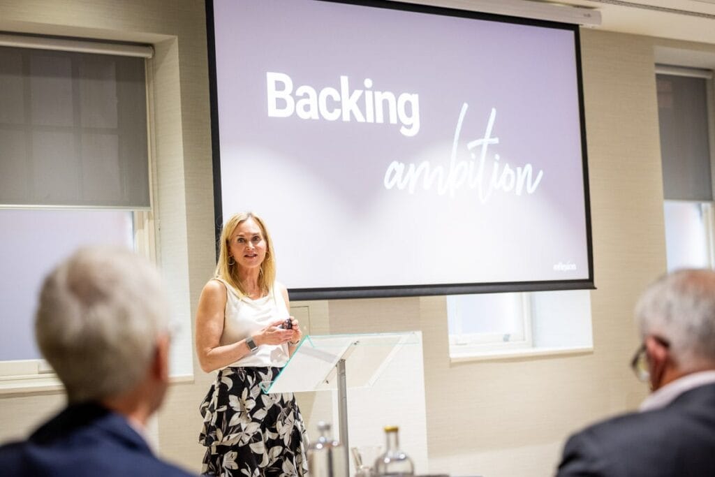 photograph of speaker at London conference