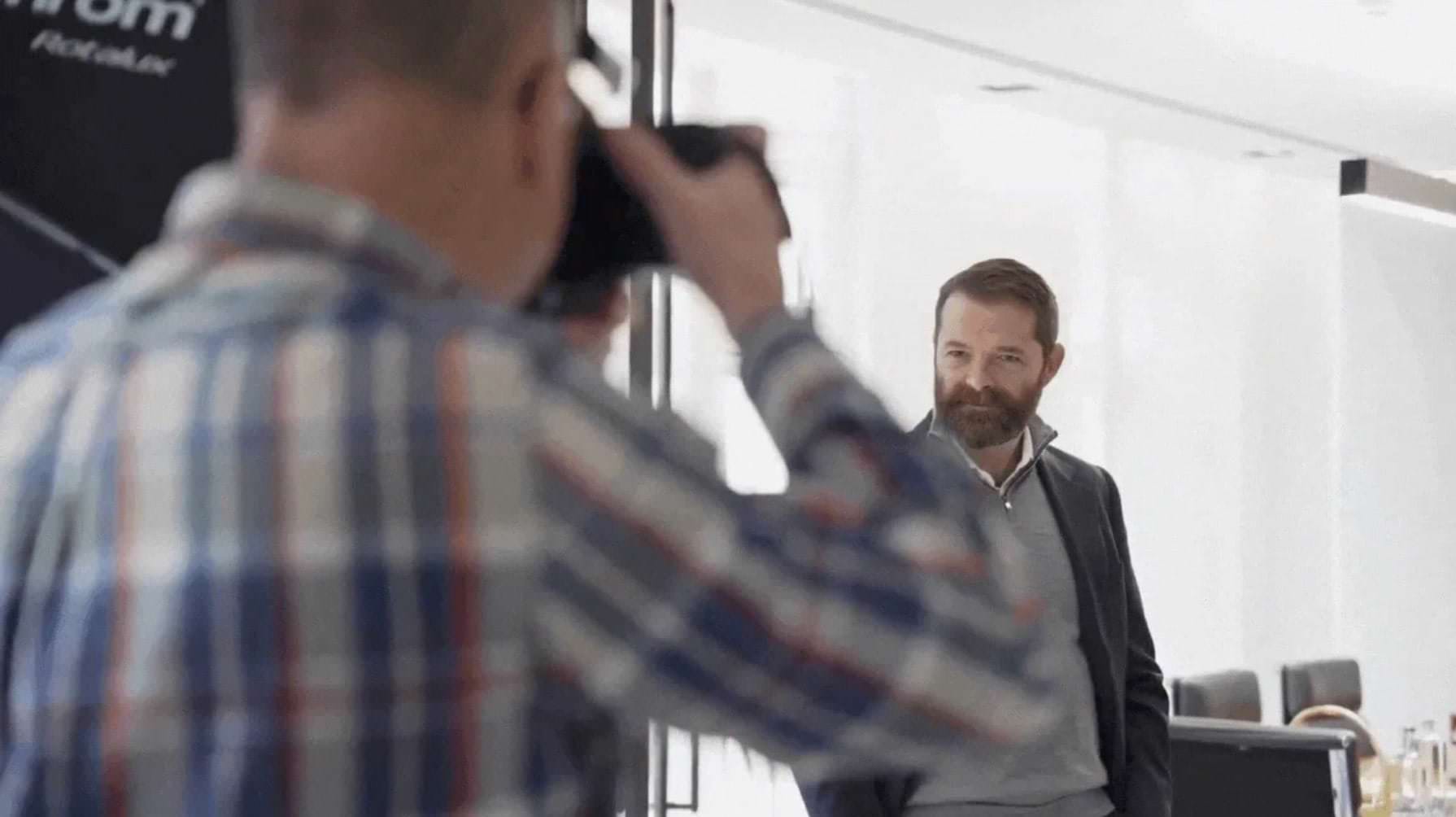 Corporate photographer at work during photo shoot