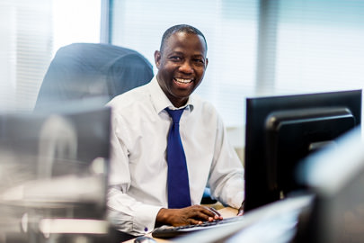 Annual Report Photography of staff working in offices of London Bank