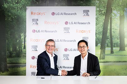 PR photograph of handshake during deal signing