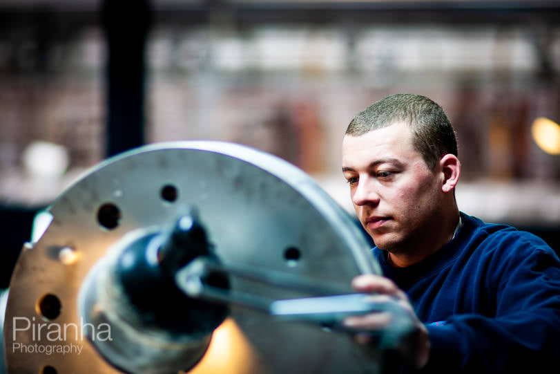 Factory worker photographed in Germany for private equity client.