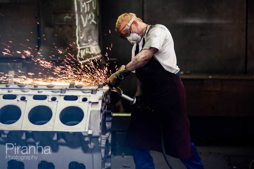 Factory worker photographed in Germany for private equity client.