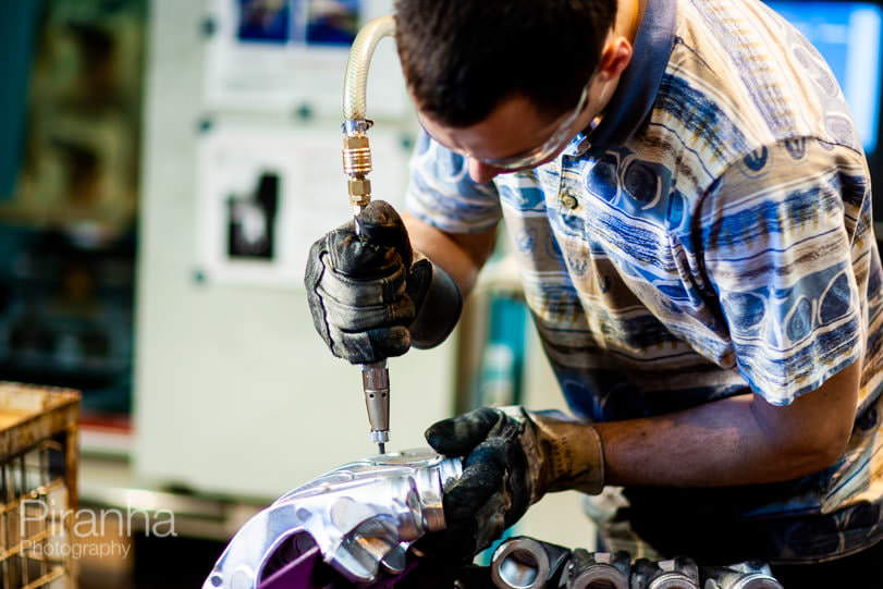 Factory worker photographed in Germany for private equity client.