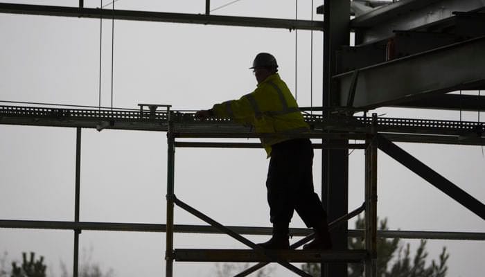 Location photography in black and white of building site under construction