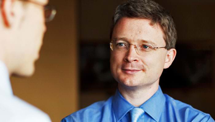Portrait photograph of Mark McComiskey, Chairman of Torus