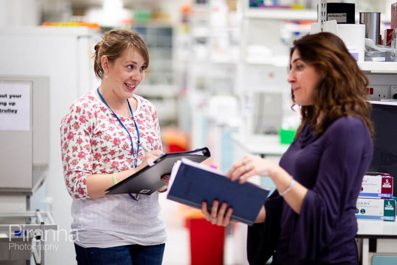 Professional photograph of medical professionals in Manchester hospital photographed in conversation