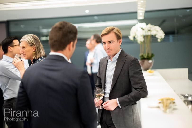 Private equity company evening event photography in London - guests at drinks party