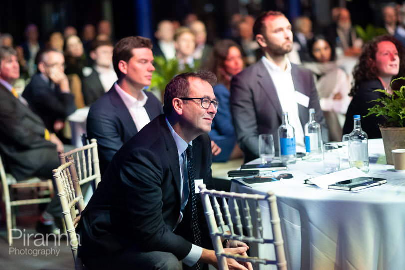 Corporate Event Photography at 7 Famous London Venues The Roundhouse corporate photography - reaction of audience to speaker