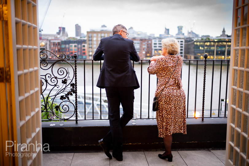 Corporate Event Photography at 7 Famous London Venues Anniversary Party photography at Shakespeare's Globe - admiring the view