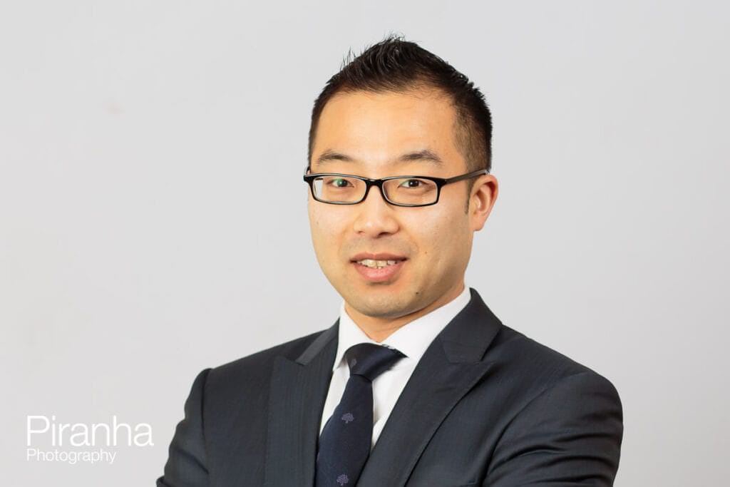 Corporate headshot photographer - photograph with plain background