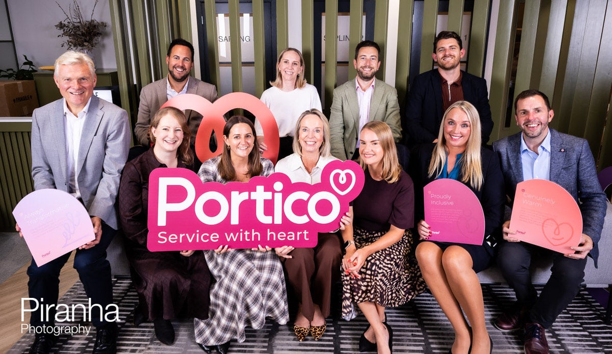 Group photograph of company's team taken in Central London