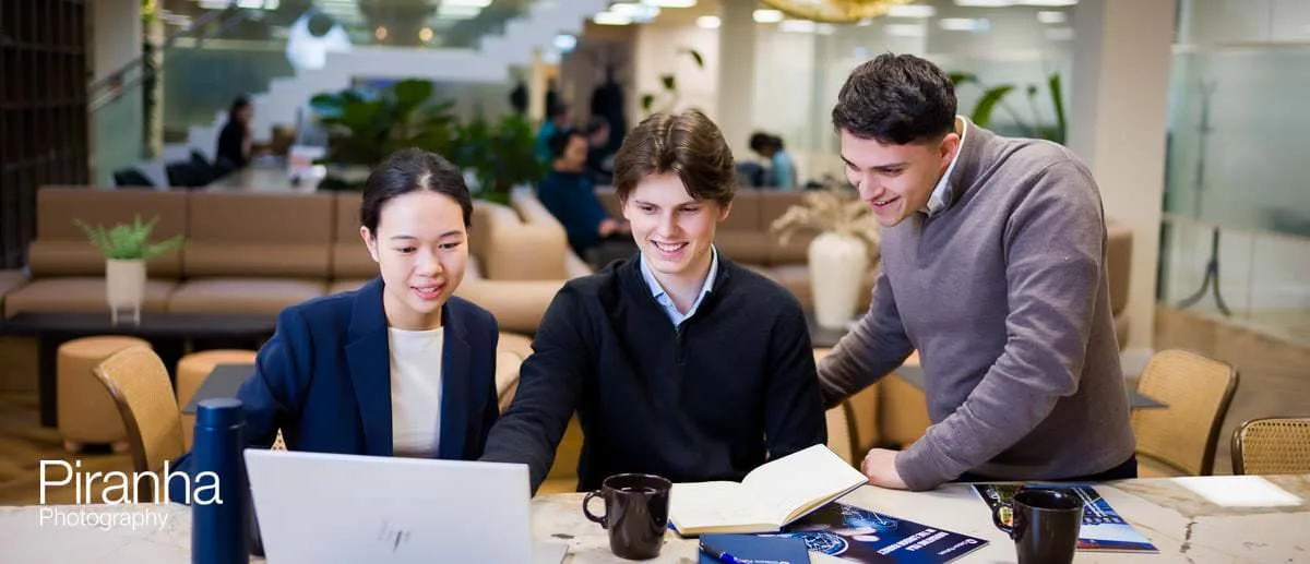 Office photograph of team at work for new website careers section.