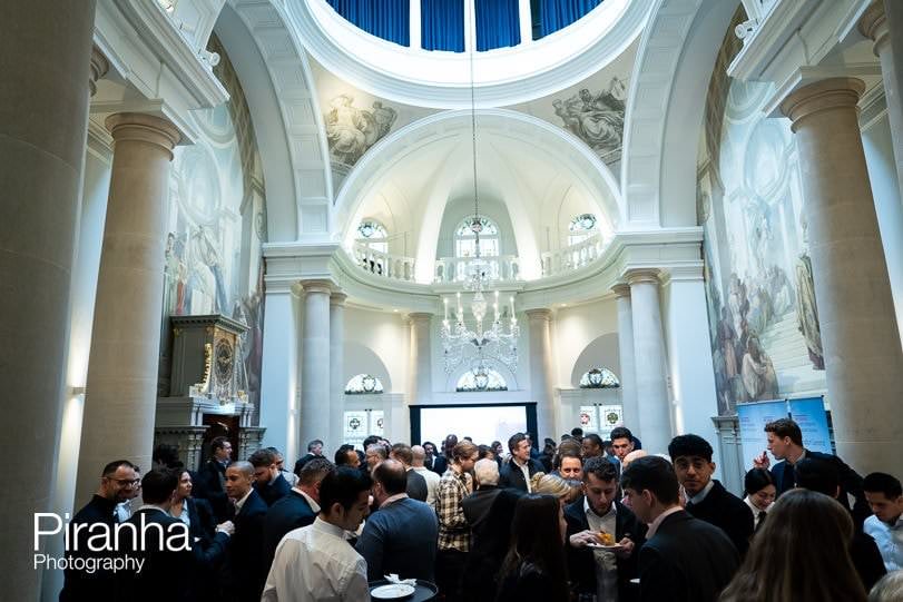 People attending meeting photographed during corporate event in London