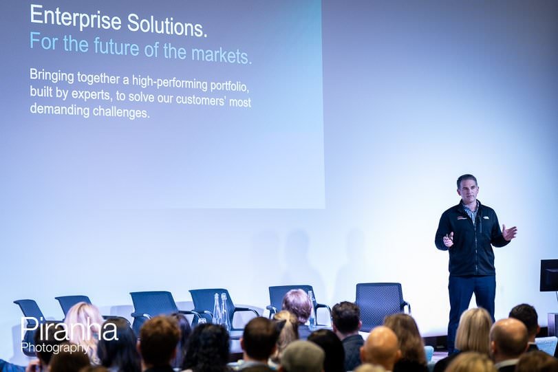 Presenter photographed during corporate event in London