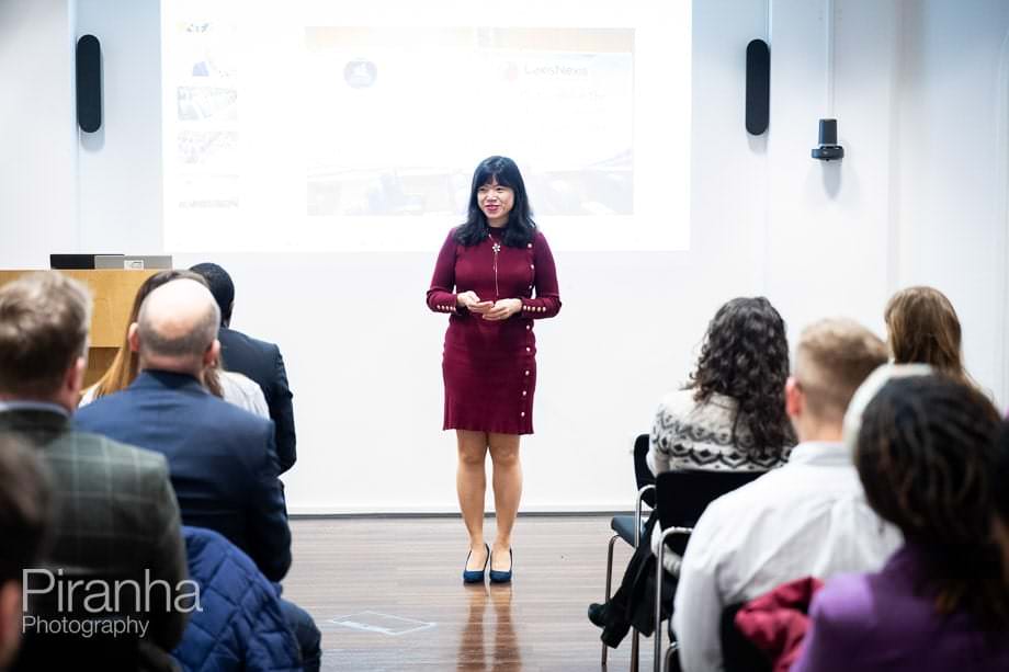Company conference photographed in London offices.