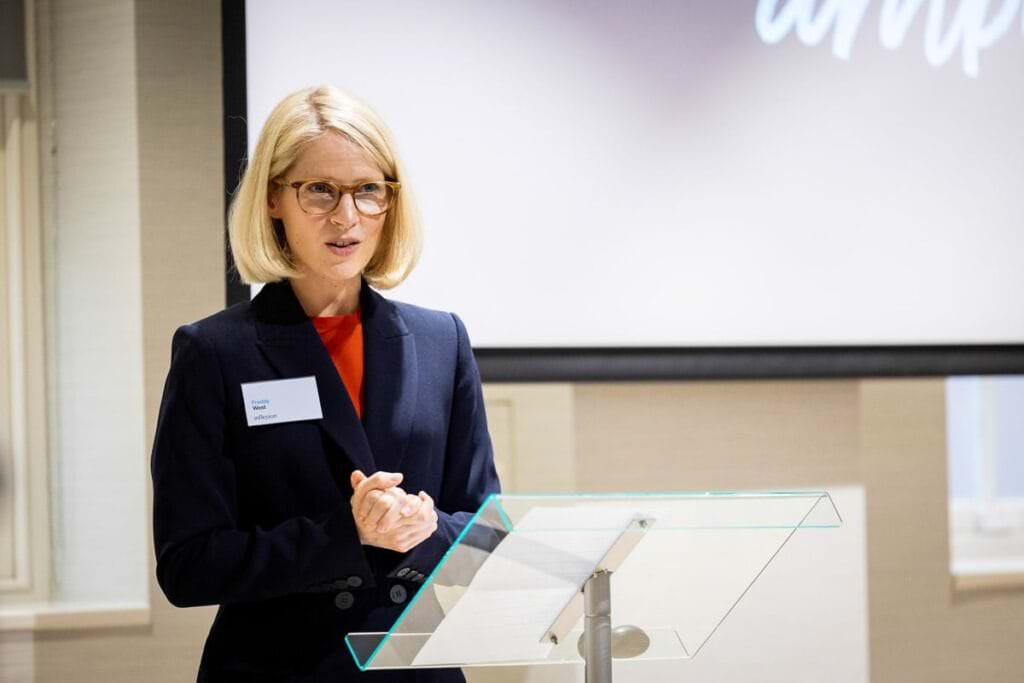 photograph of speaker at London conference