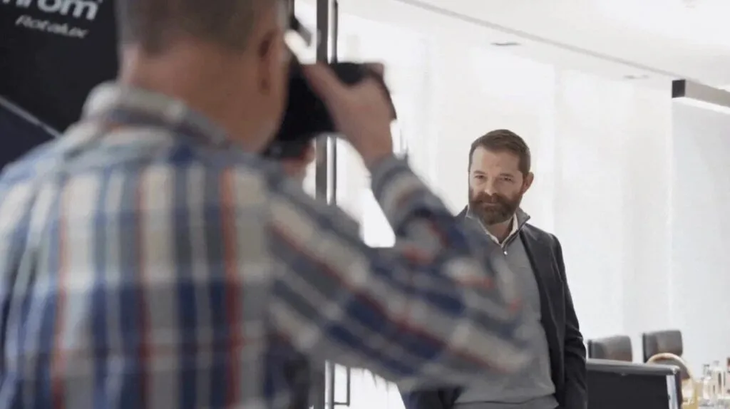 Corporate photographer at work during photo shoot